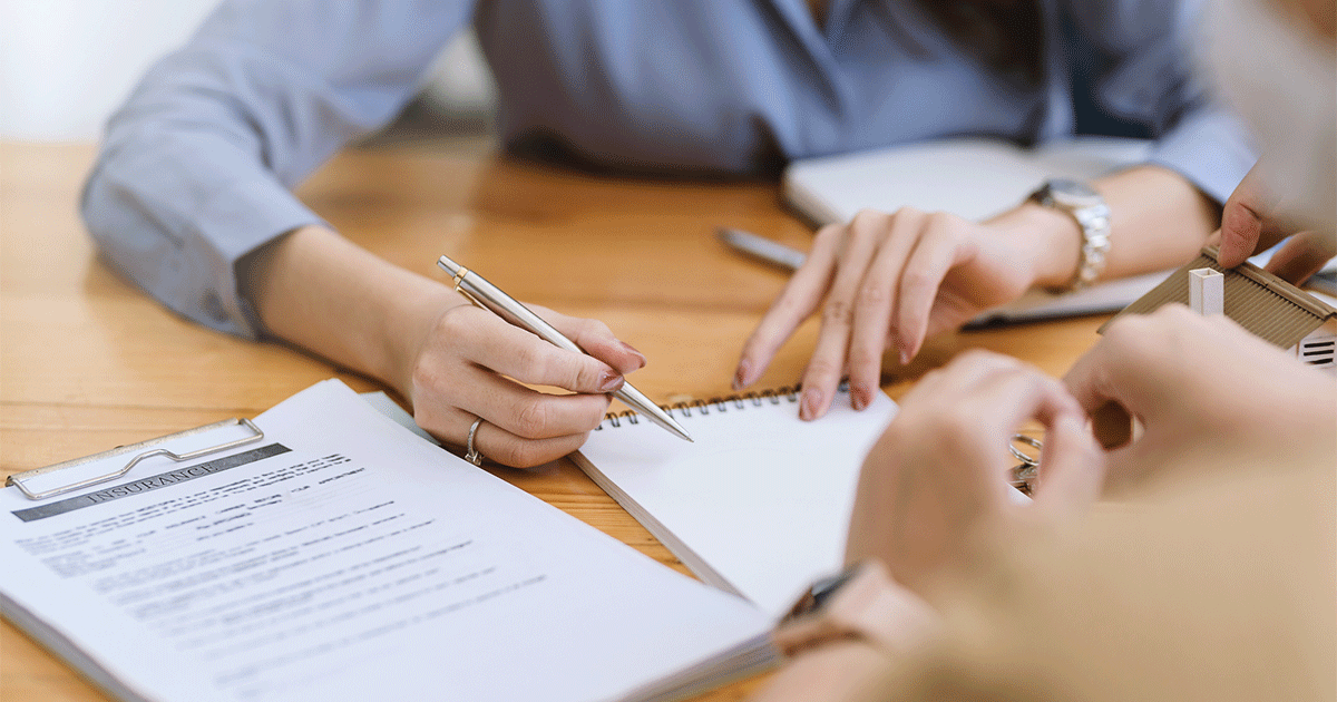 Woman signing future loan